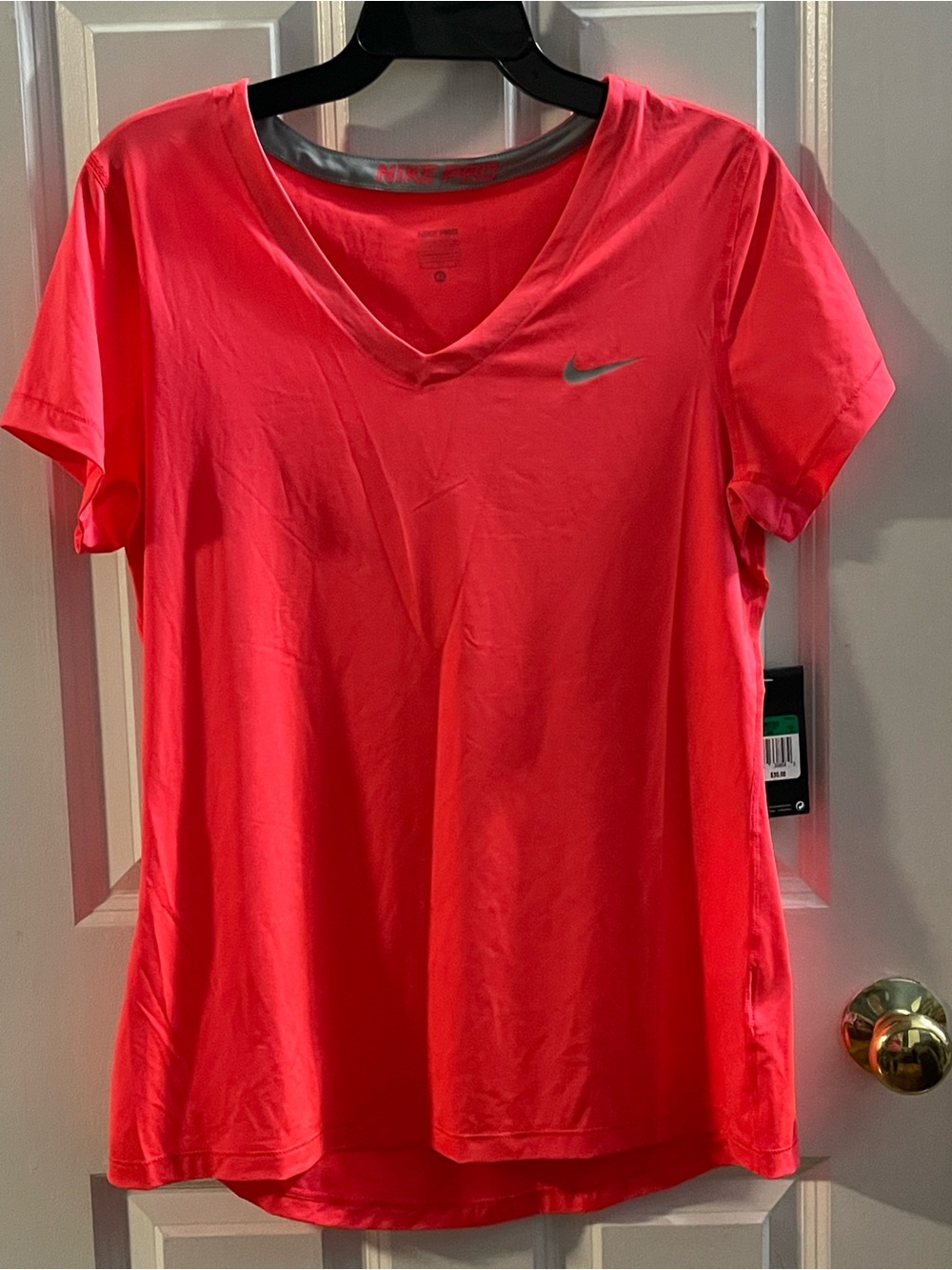Nike Women’s V-Neck Short Sleeve Tee - Coral